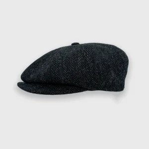Zwarte Harris tweed pet van het merk Wellington.