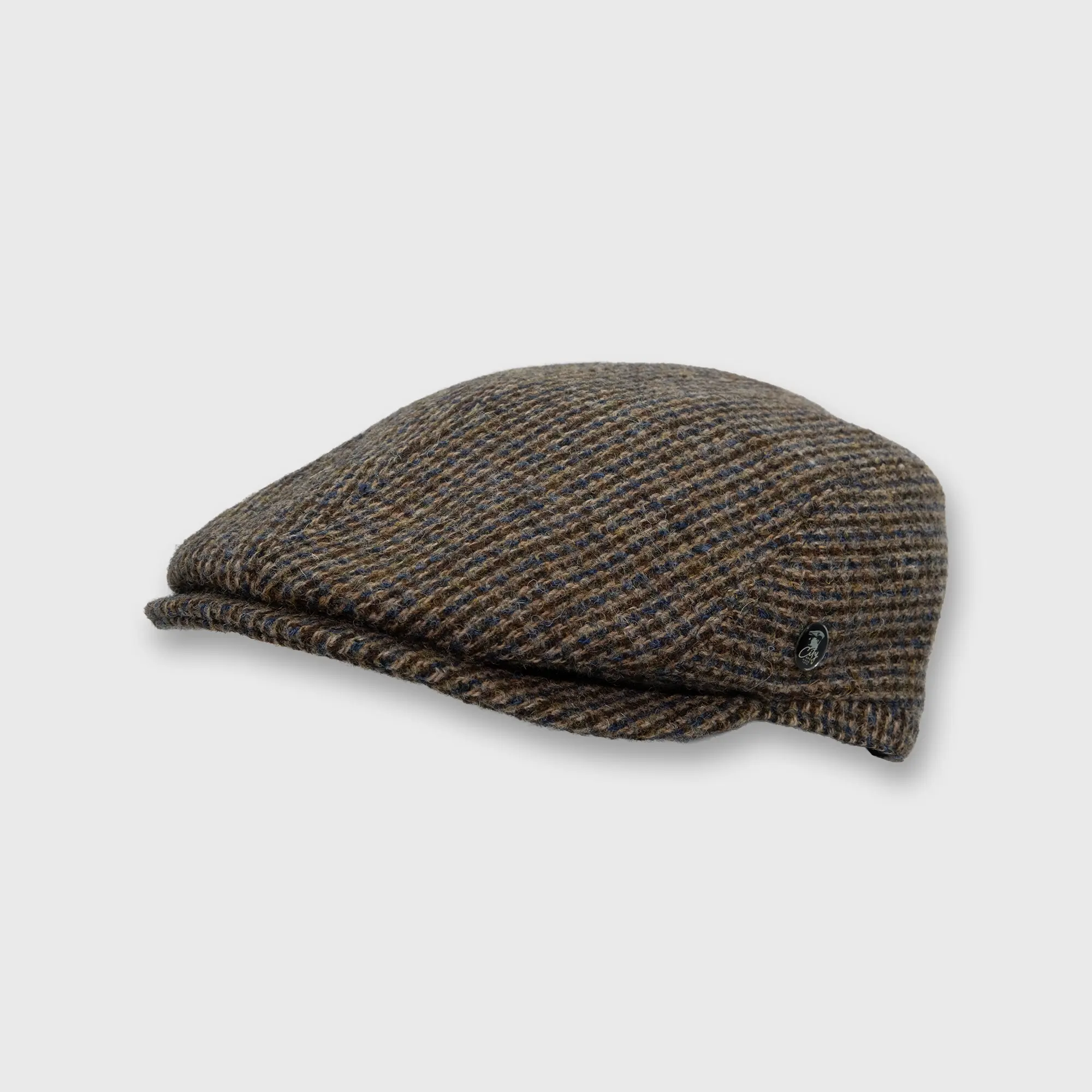The driver Harris tweed brun faux uni, incliné