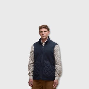 Man dressed casually in the Lowich navy waistcoat by Barbour, thumbnail