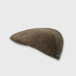 Een klassieke vorm van pet oftewel flat cap, in een bruine kleur en visgraat patroon van het merk Marone op de webshop van Harbor of men thumbnail.