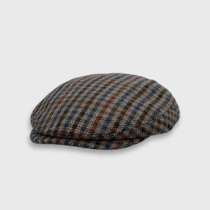 Casquette plate à motif de carreaux multicolores mêlant rouge, brun, vert et noir, en laine de la marque Alfonso D'este, sur la boutique Harbor of Men, incliné