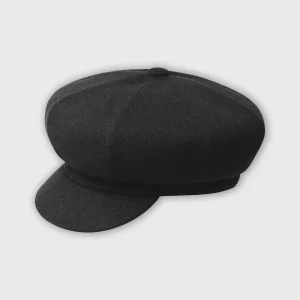 Zwarte wollen newsboy pet met een gestructureerde klep en zachte kroon, getoond op een neutrale achtergrond.