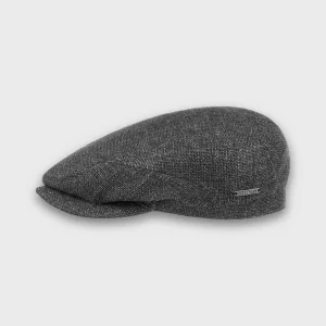 Casquette plate de la marque Stetson, réalisée dans un mélange de matières dont le lin et la laine, de couleur grise.