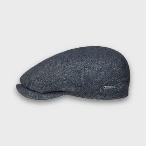 Casquette plate de la marque Stetson, réalisée dans un mélange de matières dont le lin et la laine, de couleur bleu-gris.