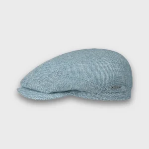 Casquette plate de la marque Stetson, réalisée dans un mélange de matières dont le lin et la laine, de couleur bleu clair.