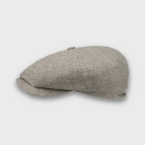 Newspaper Boy Cap, gemaakt uit een linnen- en wolblend van het merk Stetson en in een crรจme kleur.