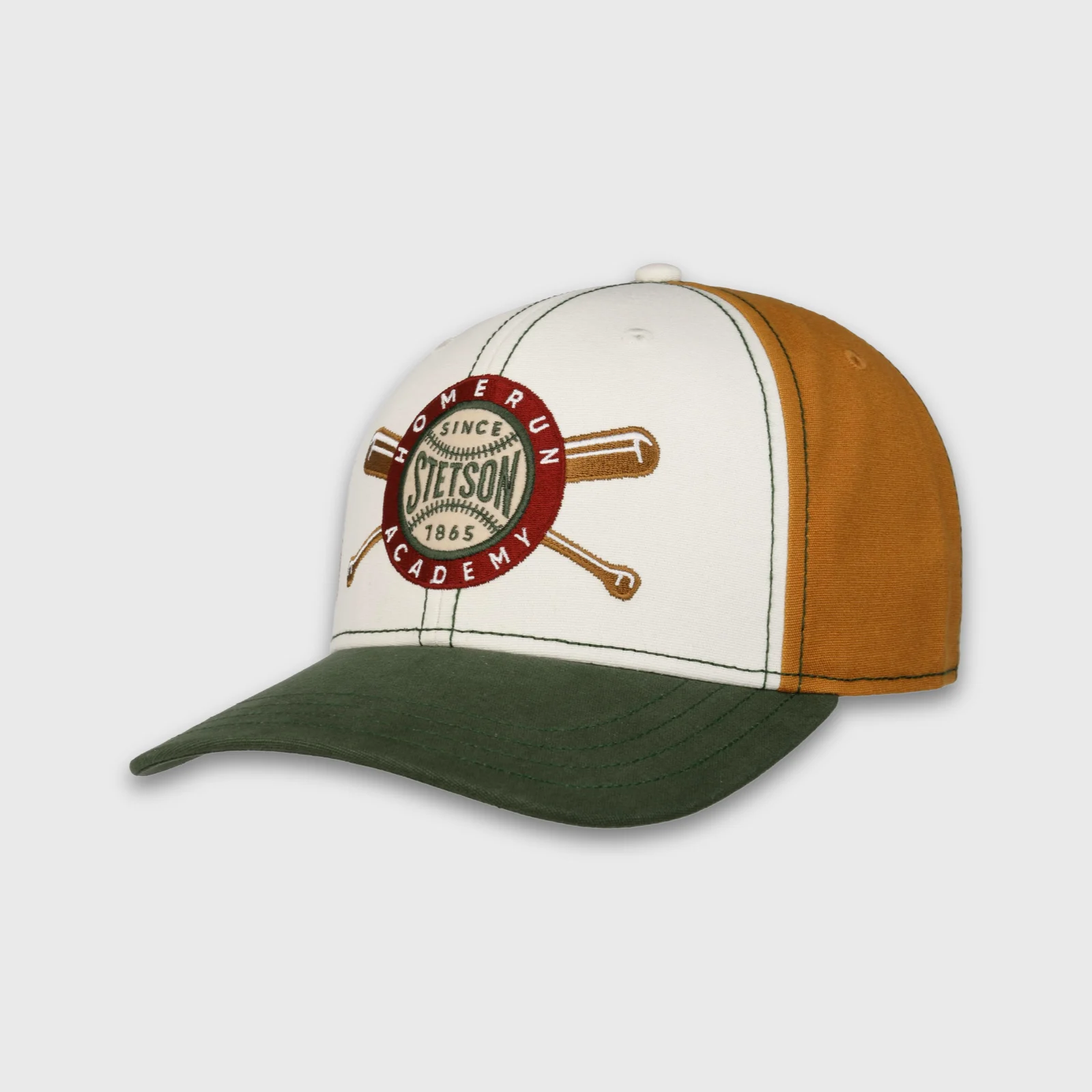 Casquette de baseball cognac, blanche et verte de la marque Stetson.