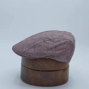 Smalle flat cap in een frambozenrode kleur, gemaakt van linnen door merk Portaluri thumbnail.