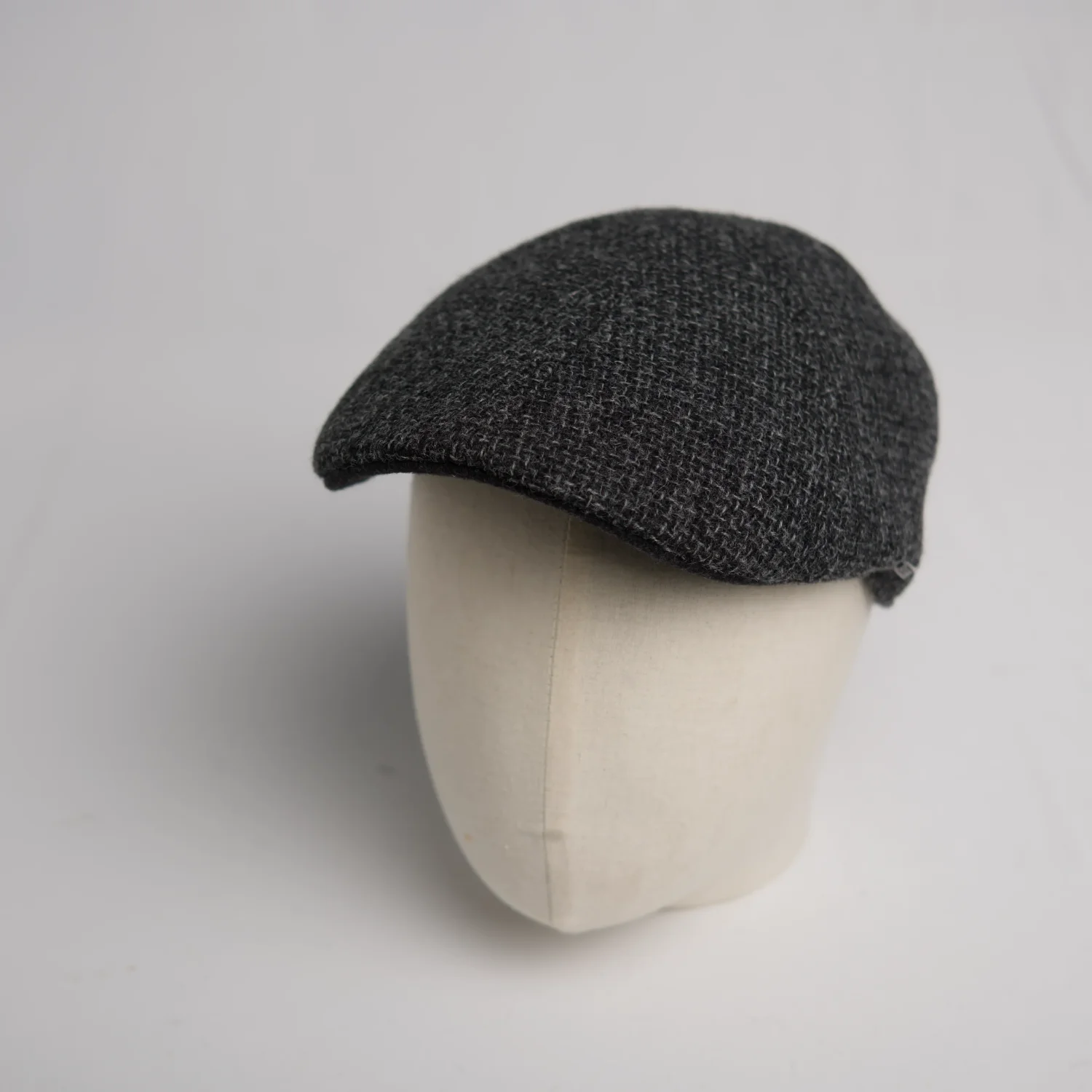 Stetson Texas 6-panel flat cap made from gray wool, side view.